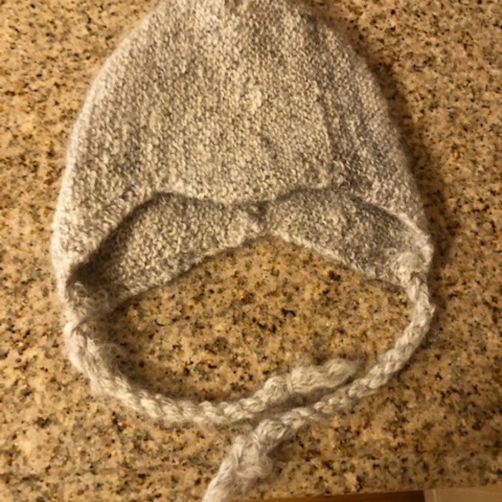 Hand Knit Oatmeal Color (Infant) Baby Hat, probably from Guatemala or Peru.